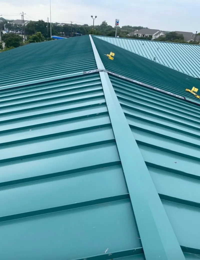Green commercial metal roof ridge and valley for Metal Roof Repair in Briar Chapel