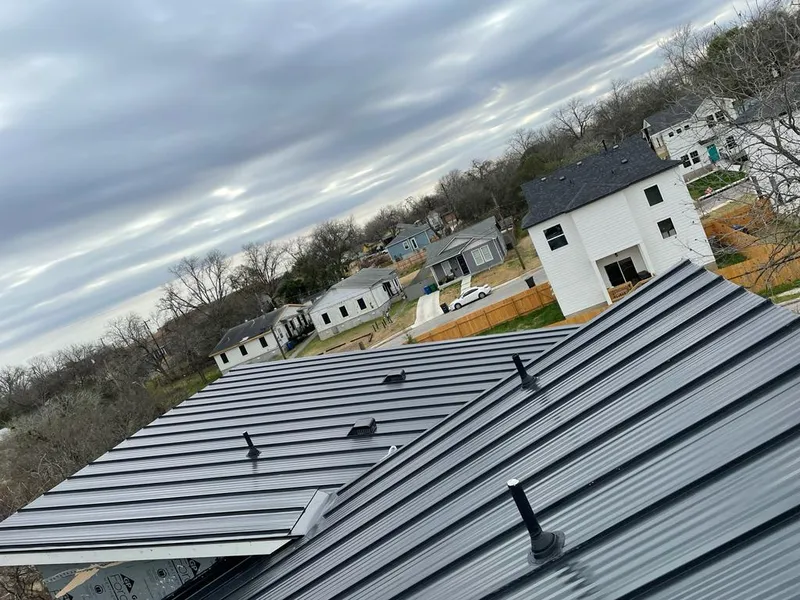 Standing seam metal roof panels with vents for Skylight Repair in Briar Chapel